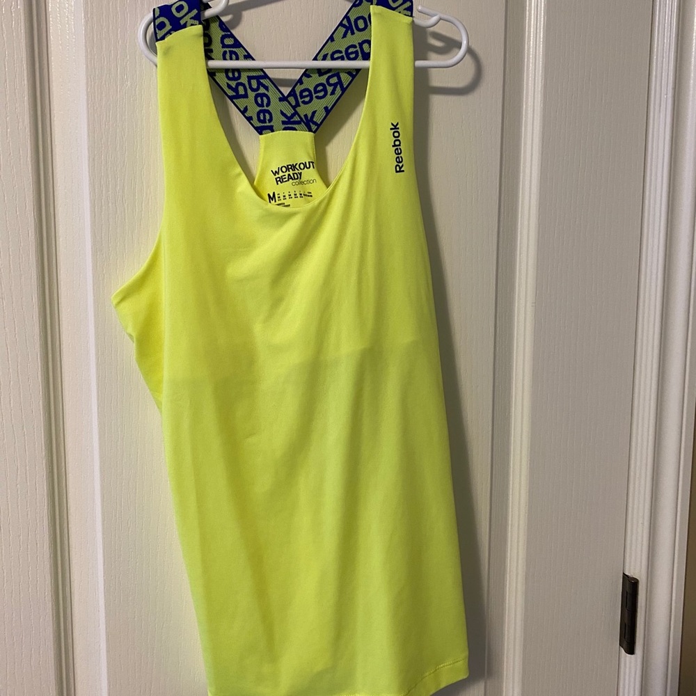 Reebok tank top. Yellow. Size medium. Almost new.
